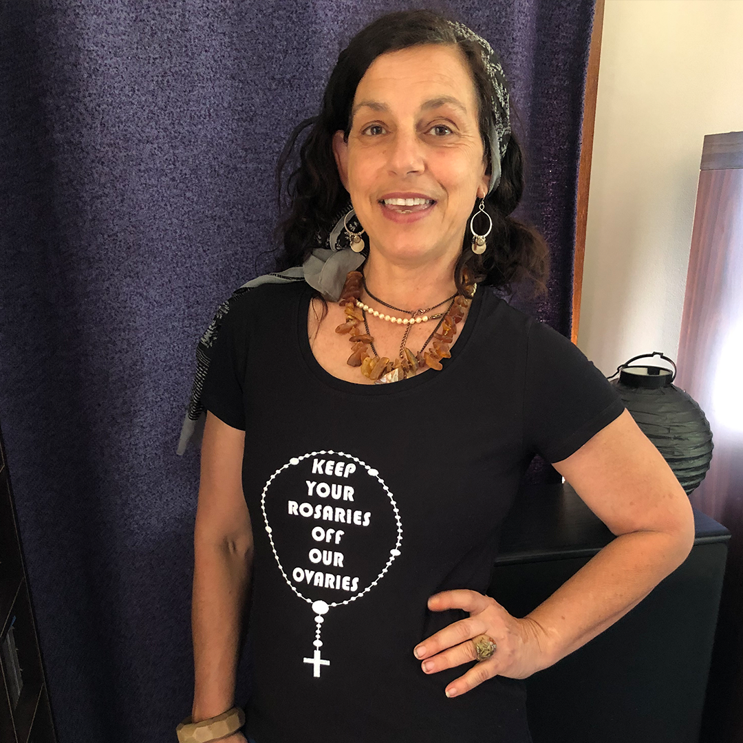 T-Shirt with "KEEP YOUR ROSARIES OFF OUR OVARIES" hand screenprint.